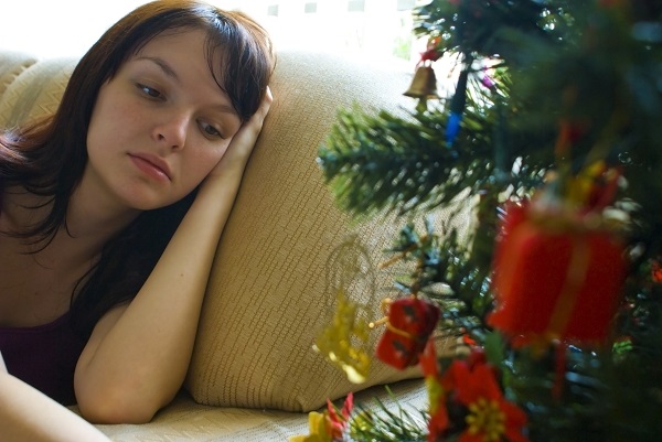 alone for holidays woman sad